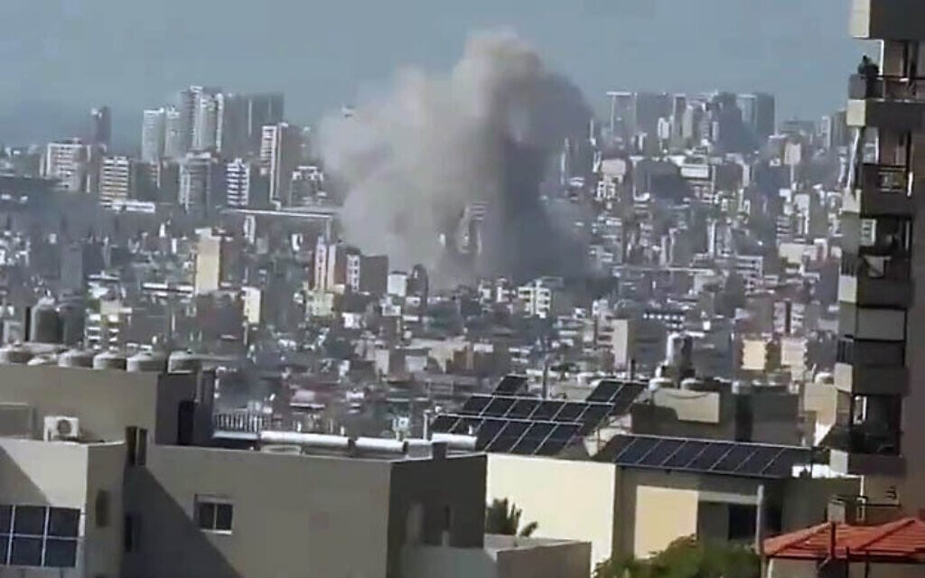 Smoke rises after a 'targeted' IDF strike on a Hezbollah target in Beirut, September 24, 2024. (Screenshot via social media used in accordance with Clause 27a of the Copyright Law)