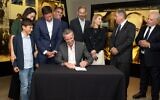 California Governor Gavin Newsom signs a bill promoting the restitution of Nazi-looted art and personal property stolen during the Holocaust. (Office of CA Gov. Gavin Newsom via JTA)