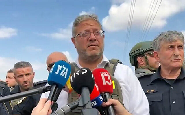 National Security Minister Itamar Ben Gvir speaks to the press at the scene of a shooting near the Palestinian city of Tarqumiyah in the West Bank, September 1, 2024. (Screen capture: X/Itamar Ben Gvir, used in accordance with Clause 27a of the Copyright Law) National Security Minister Itamar Ben Gvir speaks to the press at the scene of a shooting near the Palestinian city of Tarqumiyah in the West Bank, September 1, 2024. (Screen capture: X/Itamar Ben Gvir, used in accordance with Clause 27a of the Copyright Law)