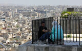 People visit the Citadel of Aleppo in northern Syria on March 31, 2024, during the Muslim holy fasting month of Ramadan. (LOUAI BESHARA / AFP)