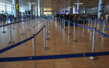 Passengers stand in line at Ben Gurion Airport during a nationwide strike demanding the government reach a hostage release deal, September 2, 2024. (GIL COHEN-MAGEN / AFP)