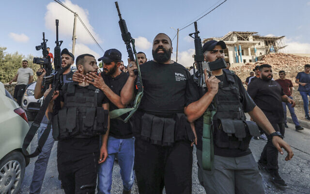 Members of Palestinian terror groups take part in the funeral procession of one of the five men killed by Israel in the West Bank on September 5, 2024. (Jaafar ASHTIYEH / AFP)