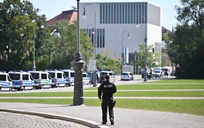 Police officers in Munich secure the area after a shooting near the Israeli consulate and the building of the Documentation Centre for the History of National Socialism on September 5, 2024. (Lukas Barth-Tuttas/AFP)