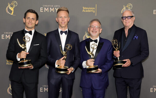 Benj Pasek (from left), Justin Paul, Marc Shaiman, and Scott Wittman, pose with their Emmy Award for their work on 'Only Murders in the Building' at Peacock Theater on September 8, 2024 in Los Angeles, California. (KEVIN WINTER Getty Images via AFP) Benj Pasek (from left), Justin Paul, Marc Shaiman, and Scott Wittman, pose with their Emmy Award for their work on 'Only Murders in the Building' at Peacock Theater on September 8, 2024 in Los Angeles, California. (KEVIN WINTER Getty Images via AFP)