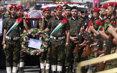 Members of Palestinian Authority's security forces carry the body of slain Turkish-American International Solidarity Movement activist Aysenur Ezgi Eygi during a funeral procession in Nablus in the West Bank on September 9, 2024. (Jaafar ASHTIYEH / AFP)