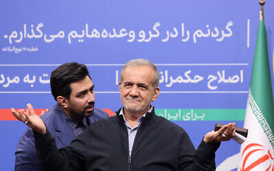 Iran's President Masoud Pezeshkian gestures as he speaks to reporters during his press conference in Tehran on September 16, 2024. (ATTA KENARE / AFP)