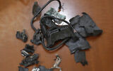 A photo taken on September 18, 2024, in Beirut's southern suburbs shows the remains of exploded pagers on display at an undisclosed location. The pagers were used by Hezbollah and the attack has been blamed on Israel. (AFP)