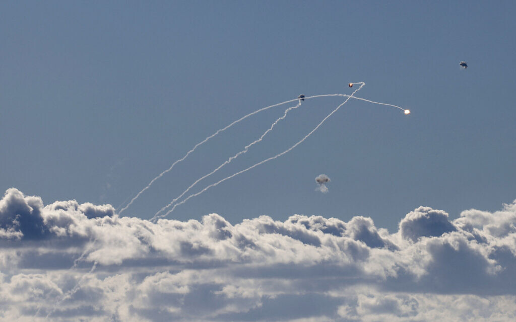 Rockets fired from southern Lebanon are intercepted by Israel's Iron Dome air defense system over the Upper Galilee region in northern Israel on September 18, 2024. (Jalaa MAREY / AFP)