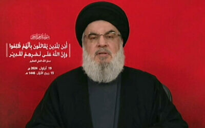 An image grab taken from Hezbollah's Al-Manar TV shows the Lebanese terror group's chief Hassan Nasrallah addressing the nation from an undisclosed location on September 19, 2024. (Al-Manar/AFP)