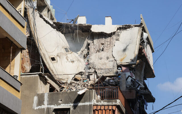 A residential building whose top two floors were hit by an Israeli strike in the Ghobeiri area of Beirut's southern suburbs on September 24, 2024, that killed a Hezbollah commander. (ANWAR AMRO / AFP)
