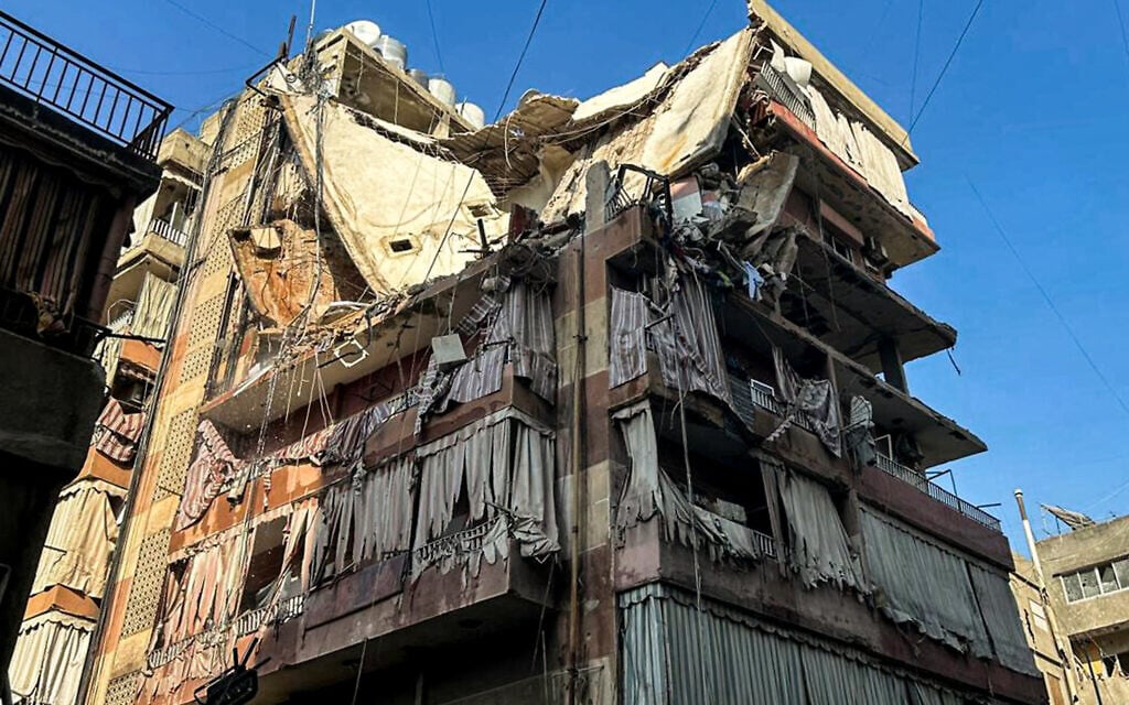 A residential building whose top two floors were hit by an Israeli strike in the Ghobeiri area of Beirut's southern suburbs on September 24, 2024. (Anwar AMRO / AFP)