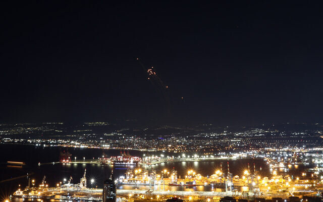 Rockets fired from southern Lebanon are intercepted by Israel's Iron Dome air defence system as seen from Haifa in northern Israel, on September 24, 2024. (Photo by Jack Guez / AFP)