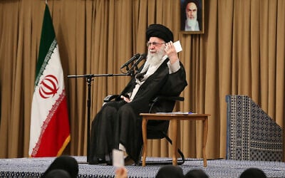 Iran's Supreme Leader Ayatollah Ali Khamenei greets an audience during a meeting with military personnel and veterans of the 1980-88 Iran-Iraq war, in Tehran, Iran, on September 25, 2024. (Khamenei.ir/AFP)