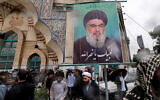 Demonstrators gather for an anti-Israel protest in Tehran's Palestine Square on September 28, 2024, after the Iran-backed Lebanese Hezbollah group confirmed reports of the killing of its leader Hassan Nasrallah in an Israeli airstrike in Beirut the previous day. (Atta Kenare / AFP)