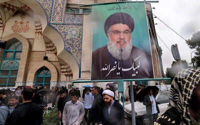 Demonstrators gather for an anti-Israel protest in Tehran's Palestine Square on September 28, 2024, after the Iran-backed Lebanese Hezbollah group confirmed reports of the killing of its leader Hassan Nasrallah in an Israeli airstrike in Beirut the previous day. (Atta Kenare / AFP)