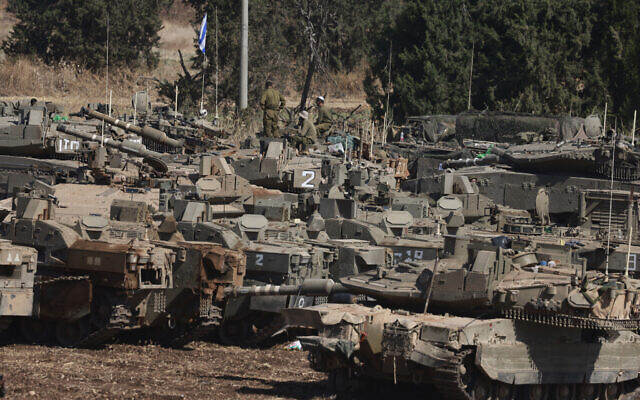 Israeli army tanks are deployed in northern Israel near the border with Lebanon on September 29, 2024 (Menahem KAHANA / AFP)