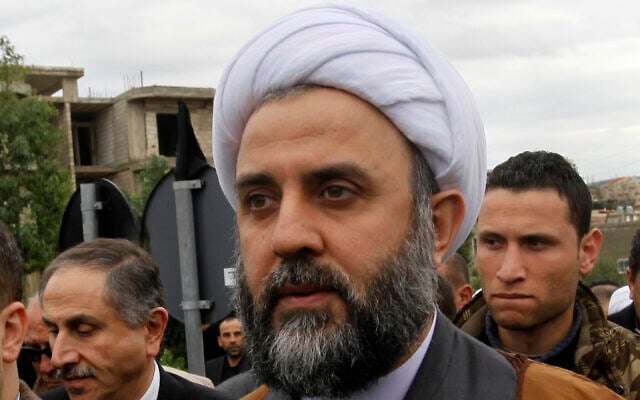 In this January 26, 2010, Sheik Nabil Qaouk, a member of Hezbollah's Central Council, attends the funeral of prominent businessman Hassan Tajeddine, in the southern village of Hanaway, Lebanon (AP Photo/Hussein Malla)
