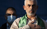 Hamas chief Yahya Sinwar gestures on stage after greeting supporters at a rally  in Gaza City, May 24, 2021. (AP Photo/ John Minchillo)