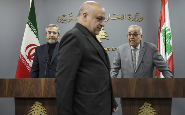 Iranian Ambassador to Lebanon, Mojtaba Amani, center, walks in front of Iranian interim Foreign Minister Ali Bagheri Kani, left, and Lebanese Foreign Minister Abdallah Bouhabib, during a news conference in Beirut, Lebanon, June 3, 2024 (AP Photo/Hassan Ammar)