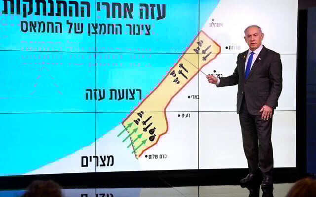 Prime Minister Benjamin Netanyahu stands before a map of the Gaza Strip, telling viewers how Hamas has imported arms into the territory since Israel's withdrawal in 2005, during a news conference in Jerusalem, Monday, Sept. 2, 2024. (AP Photo/Ohad Zwigenberg, Pool) Prime Minister Benjamin Netanyahu stands before a map of the Gaza Strip, telling viewers how Hamas has imported arms into the territory since Israel's withdrawal in 2005, during a news conference in Jerusalem, Monday, Sept. 2, 2024. (AP Photo/Ohad Zwigenberg, Pool)