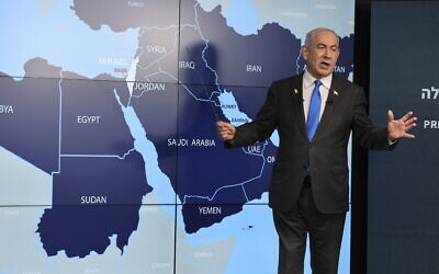Prime Minister Benjamin Netanyahu stands before a map during a press conference at the Government Press Office in Jerusalem, September 4, 2024. (Abir Sultan/Pool via AP)
