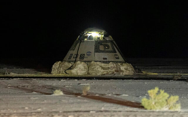 The empty Boeing Starliner capsule sits at White Sands Missile Range in New Mexico, Sept. 6, 2024, after undocking from the International Space Station. (Boeing via AP) The empty Boeing Starliner capsule sits at White Sands Missile Range in New Mexico, Sept. 6, 2024, after undocking from the International Space Station. (Boeing via AP)