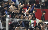 Italy's fans cheer their team during the UEFA Nations League soccer match between Israel and Italy, at Bozsik Arena, in Budapest, Hungary, September 9, 2024. (AP Photo/Denes Erdos)