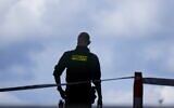 Illustrative: A police officer guards in Copenhagen, Denmark, on July 4, 2022. (AP Photo/Sergei Grits, File)