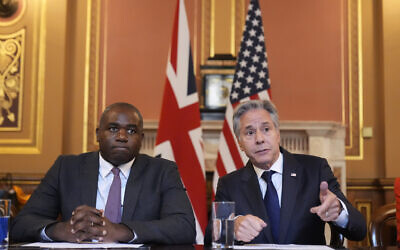 US Secretary of State Antony Blinken, right, gestures as he participates with Britain's Foreign Secretary David Lammy, in a strategic dialogue meeting at the Foreign, Commonwealth and Development Office (FCDO) in London, September 10, 2024. (Mark Schiefelbein/AP)