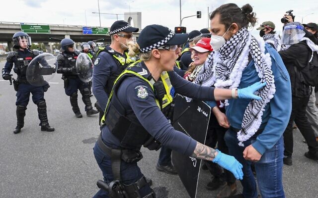 Victoria Police clash with anti-war and anti-Israel protesters outside a military arms convention in downtown Melbourne, Australia, Sept. 11, 2024. (Joel Carret/AAP Image via AP) Victoria Police clash with anti-war and anti-Israel protesters outside a military arms convention in downtown Melbourne, Australia, Sept. 11, 2024. (Joel Carret/AAP Image via AP)