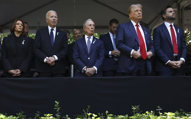 From left, Democratic presidential nominee Vice President Kamala Harris, President Joe Biden, Michael Bloomberg, Republican presidential nominee former President Donald Trump and Republican vice presidential nominee Sen. JD Vance, R-Ohio, attend the 9/11 Memorial ceremony on the 23rd anniversary of the Sept. 11, 2001 terror attacks, Wednesday, Sept. 11, 2024, in New York. (AP Photo/Yuki Iwamura)
