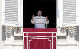Pope Francis delivers his blessing as he recites the Angelus noon prayer from the window of his studio overlooking St. Peter's Square, at the Vatican, September 15, 2024. (Andrew Medichini/AP)