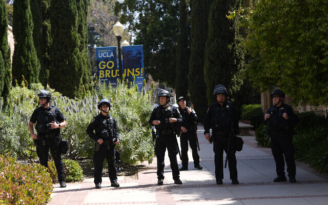 File: Police stage on the UCLA campus after nighttime clashes between pro-Israel and pro-Palestinian groups, Wednesday, May 1, 2024, in Los Angeles. (AP Photo/Jae C. Hong, File)