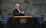 Iran's President Masoud Pezeshkian addresses the the Summit of the Future at United Nations headquarters, Sept. 23, 2024. (AP Photo/Seth Wenig)