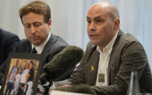 Stephen Brisley, whose sister Lianne Sharabi and nephews Noiya and Yahel Sharabi were murdered by Hamas on October 7, 2023, in Israel, and the brother-in-law of hostage Eli Sharabi, speaks at a press conference in London, September 30, 2024, ahead of the first anniversary of the kidnapping. (AP Photo/Alastair Grant)