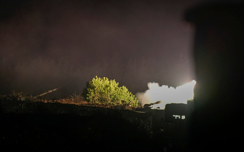 An Israeli mobile artillery unit fires a shell from northern Israel toward Lebanon, in a position near the Israel-Lebanon border, September 30, 2024. (AP Photo/Baz Ratner)