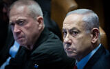 Prime Minister Benjamin Netanyahu, right, and then-Defense Minister Yoav Gallant attend a vote at the Knesset plenum in Jerusalem, March 13, 2024. (Yonatan Sindel/Flash90)