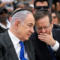 Prime Minister Benjamin Netanyahu and President Isaac Herzog attend a  memorial ceremony for Ethiopians who died on their journey to Israel, Mount Herzl, on June 5, 2024 (Arie Leib Abrams/Flash90)