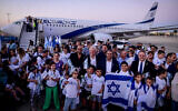 New immigrants from France arrive on a special 'Aliyah Flight' at Ben Gurion Airport on August 1, 2024. (Tomer Neuberg/Flash90)