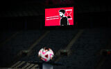 Hostage Hersh Goldberg-Polin seen on a screen during the Israeli Premier League match between Hapoel Hadera and Hapoel Jerusalem at the Teddy Stadium in Jerusalem, August 31, 2024. (Oren Ben Hakoon/Flash90)