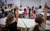 Israeli children seen on the first day of school at the Gabrieli Carmel School in Tel Aviv on September 1, 2024. (Avshalom Sassoni/Flash90)