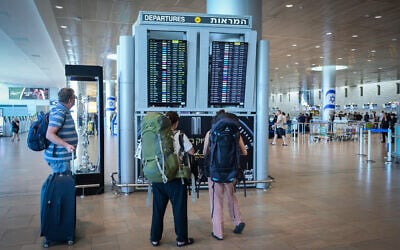 Passengers at Ben Gurion Airport, where flights are delayed during a nationwide strike demanding the government reach a hostage release deal, September 2, 2024. (Avshalom Sassoni/Flash90)