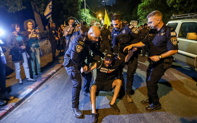 Police detain a protester calling for the release of hostages held by Hamas in Gaza and against the current government, in Jerusalem, September 2, 2024. (Noam Revkin Fenton/Flash90) Police detain a protester calling for the release of hostages held by Hamas in Gaza and against the current government, in Jerusalem, September 2, 2024. (Noam Revkin Fenton/Flash90)