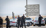 Police at the scene where three Israelis were killed in a terror shooting attack at Allenby Bridge, a crossing between West Bank and Jordan, September 8, 2024. (Yonatan Sindel/Flash90)