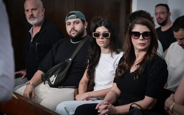 Noa Goldenberg, 27 (C), during a hearing at the Tel Aviv Magistrate's Court after being charged with throwing sand at National Security Minister Itamar Ben-Gvir on a beach in Tel Aviv, September 9, 2024. (Avshalom Sassoni/Flash90) Noa Goldenberg, 27 (C), during a hearing at the Tel Aviv Magistrate's Court after being charged with throwing sand at National Security Minister Itamar Ben-Gvir on a beach in Tel Aviv, September 9, 2024. (Avshalom Sassoni/Flash90)