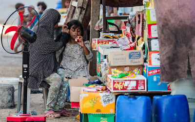Displaced Palestinians live in shelter tents in Deir al-Balah, in the central Gaza Strip, September 12, 2024. (Ali Hassan/Flash90)