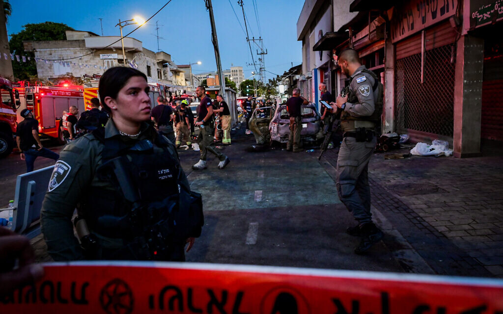 Israeli security forces at the scene of a deadly explosion, believed to be connected to an ongoing feud between crime families, in the central Israel city of Ramle, September 12, 2024. (Avshalom Sassoni/ Flash90) Israeli security forces at the scene of a deadly explosion, believed to be connected to an ongoing feud between crime families, in the central Israel city of Ramle, September 12, 2024. (Avshalom Sassoni/ Flash90)