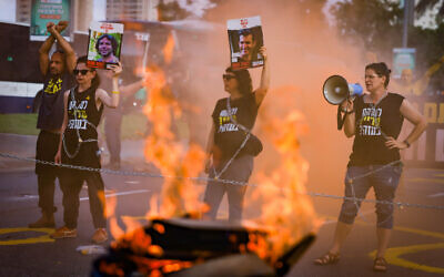 Hostage families block Tel Aviv's Begin Road during an anti-government, pro-hostage deal protest, September 13, 2024. (Chaim Goldberg/Flash90)
