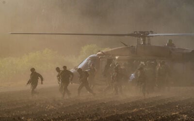 IDF troops evacuate soldiers wounded by a Hezbollah missile attack against the the Ramim Ridge area, near the border with Lebanon, September 19, 2024. (Ayal Margolin/Flash90)