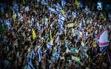 Demonstrators calling for the release of Israeli hostages held by Hamas rally outside the Kirya military base in Tel Aviv, September 21, 2024. (Avshalom Sassoni/Flash90)